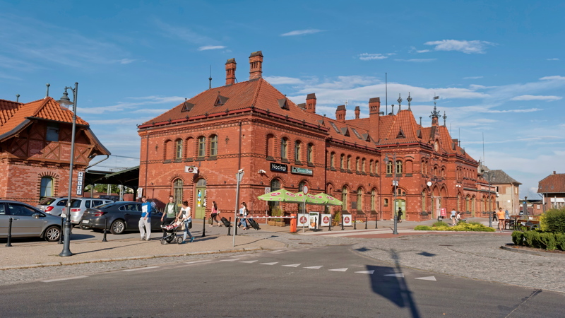 21 - The historic Malbork railway station designed in a striking neo-Gothic style using red brick located in Malbork, Poland